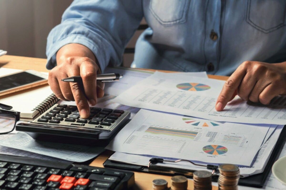 accounting concept businesswoman working using calculator with money stack office 34152 2245